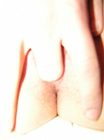 Here's a fucking close-up pic of some asshole's ass crack and palm, probably showing some anal banging action.
