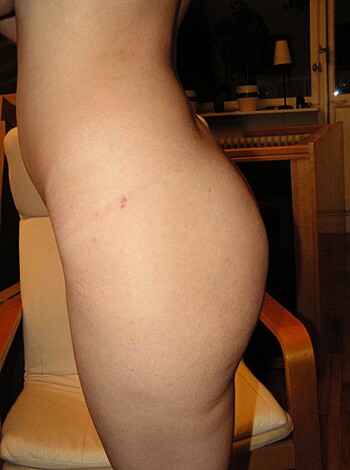"""
An ass shot of some random chick with her asshole facing upwards.
"""