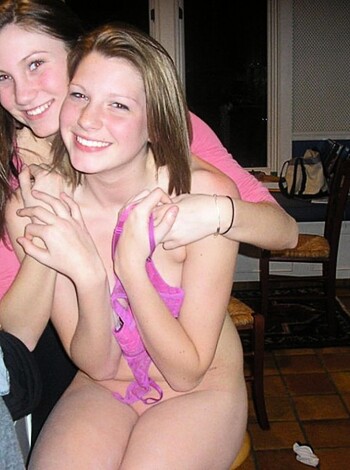 A couple of horny hoes grinning ear-to-ear as they straddle a couch, their boobies almost touching while their tits rub against each other like two fucking velvet pillows.