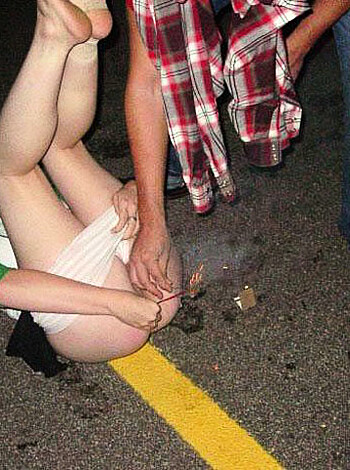 A bitch getting fucked in the backseat of her car, with a huge grin on her face while being nailed by some dude.
