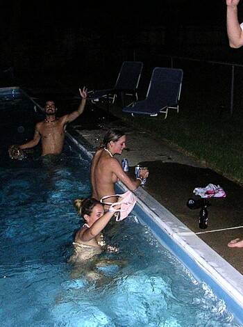A group of four douchebags getting drunk and swimming nude in a fucking lit-up pool like retards.