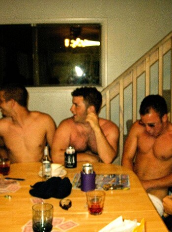 Vulgar description: Look at these dudes with their shirts off, sippin' on brews and chasin' tail while playing poker like motherfucking pros.