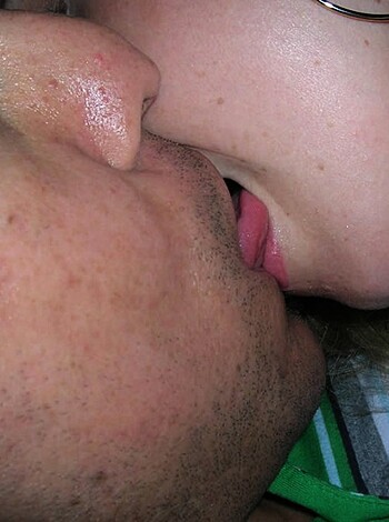 Here's the fucking picture of two people getting cozy as shit, with their faces so close together that it's probably some deep-ass makeout sesh or at least a cute ass snuggle.