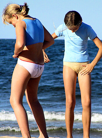 Vulgar Description: "Fuckin' two slutty bitches titty-fuckin' at the shore, bro."
