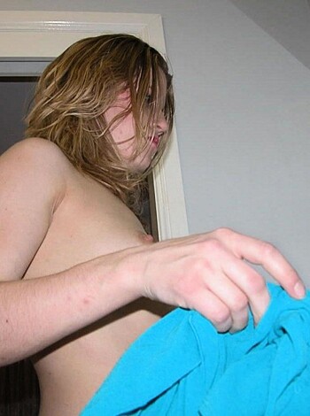 "Fucking hot bitch sucking on her tits."