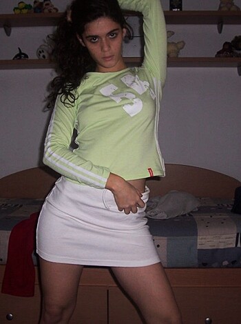 "A green-clad bitch taking pics in some fucking room."