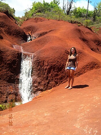 Vulgar Description: This bitch is fucking wetting her panties while posing for the camera next to a fucking goddamn waterfall!