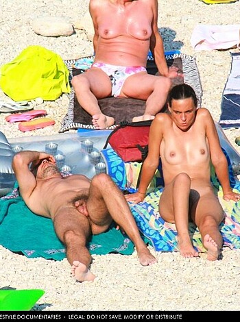 "Fuckin' hell, look at these dumbasses! A bunch of naked bros sittin' on the sandy shore like a buncha faggots. Must be a goddamn family day or somethin'. Shit looks like it could use some fuckin' booze and bitches to liven this shit up."