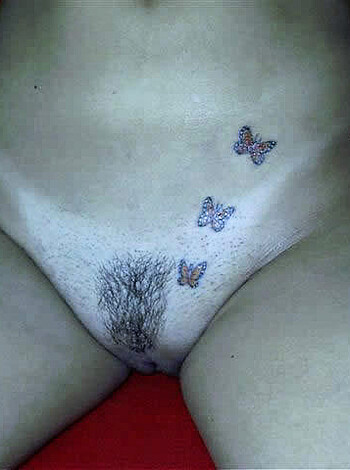 "Boring caption left out the juicy details - this chick has a sweet pussy and ass with delicate butterfly tats on 'em."