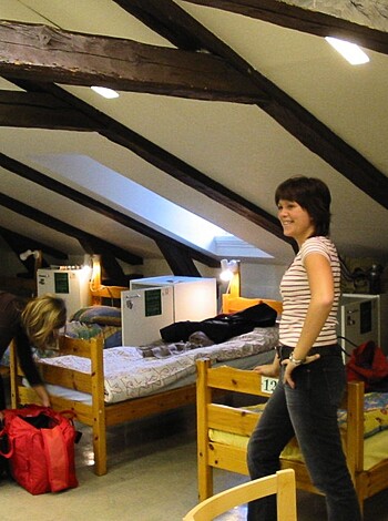 "Here's a couple of sloppy fuckers folding sheets and blankets on a college campus dorm room floor."