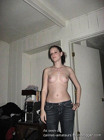 "Fuckin' hot bitch showin' off her titties and ass in jean shorts."