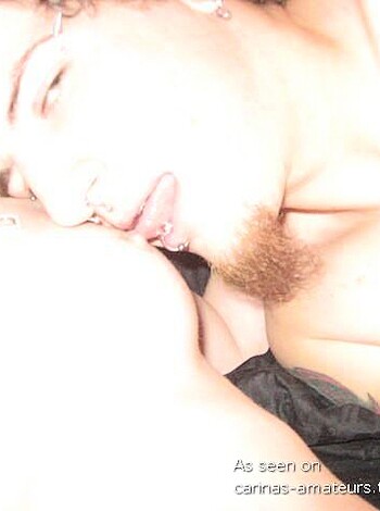 "Homoerotic scene of two dudes French kissing, their bodies tightly pressed together."