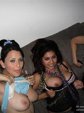 A photo of three smoking hot dimes in bralettes and panties, sitting on a couch with their boobies out.