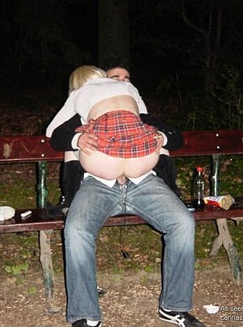 Vulgar description:
Here's a picture of some dude fucking bitch on the grass, and it looks like he's getting pounded good.