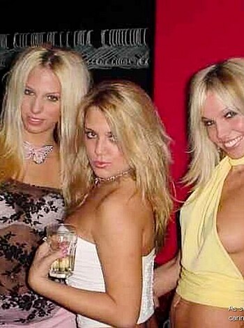 "A trio of smoking hot blondes with perky tits fucking on the couch."