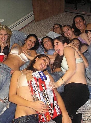 Imagine walking into someone’s home and finding a fucking shit show of a party where every girl is buck fucking naked, flashing their tits around and drinking like motherfuckers. It looks like these bitches don't give a single fuck about anyone who might walk in on them.