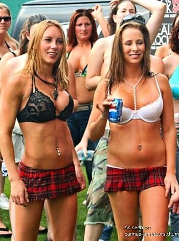 """
F*cking hell, look at these slutty bitches with their f*cking tats and f*cking piercings! Gawking like dumbasses as they stroll around in their goddamn bikini tops and shorts. God damn it, they're hot but also fucking disgusting at the same time with those stupid shit tattoos on their ass-f*cking bodies. What a waste of perfectly good skin.
"""
