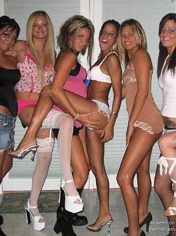 """
A fucking hot bitches showing off their boobs in lacy panties, looking sexy as hell.
"""