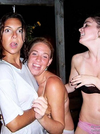 "Here's a picture of three hot chicks hangin' out, one of 'em with no shirt on, lookin' like she wants some dick. The other two are dressed in bikini shit, all lookin' fucking amaze. Guess they're havin' fun or somethin', I don't give a shit."
