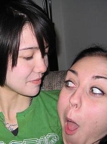 A chick is cryin' her eyes out, while her hot friend laughs at her misery.
