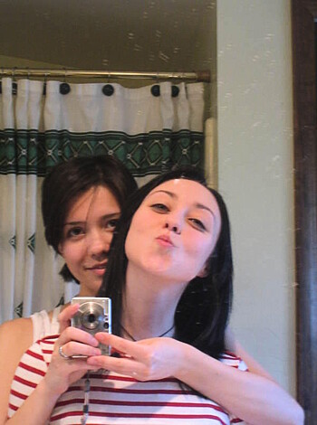 "Fuckin' hot ass bitches posing for a selfie with one suckin' on her fingers and shit."