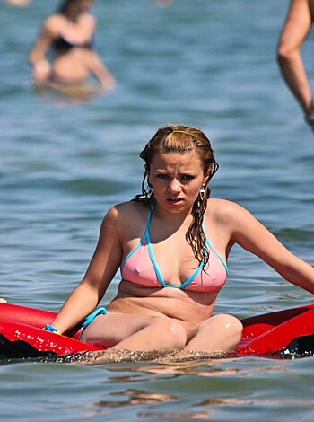 F*cking hell, why the f*ck does she look so worried while sitting on that stupid inflatable raft in her bikini?