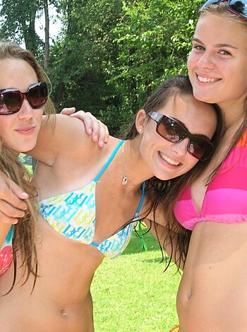 "Fucking hot chicks in bikinis, grinning on the sandy shore."