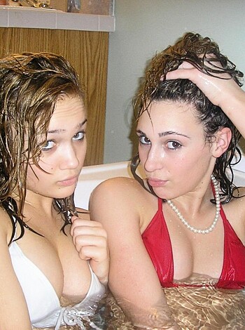 "Holy shit, two hot chicks sharing a bathtub, one of them with a surprised look on her face and the other with her fucking tits out, Jesus Christ."