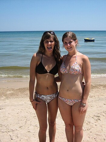 "Two hot chicks in bikinis taking a fuckin' sexy selfie on the goddamn beach, duh."