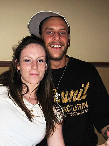 "You can see two happy people with their bodies tightly touching."
