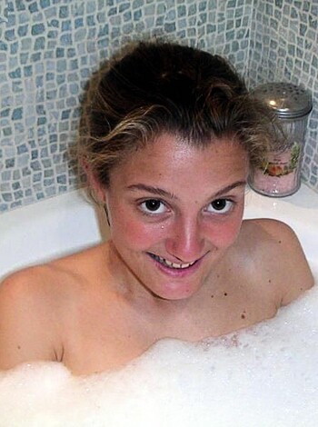 "Here's a picture of some bubble-ass bitch taking a fucking bath while she ain't wearing no top."