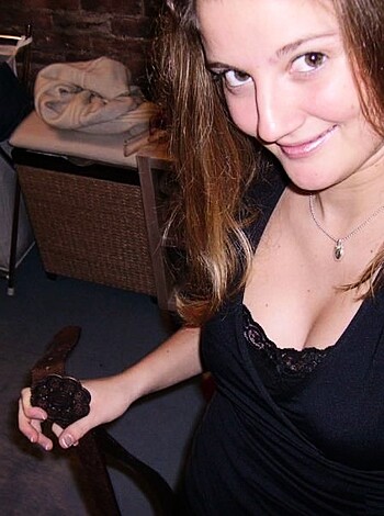 Vulgar Description: "Look at this bitch trying to be sexy by taking a fucking selfie in her slutty lingerie while flexing those fake tits."