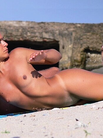 "Grab your dick because here's two fine bitches at the beach, one nude titties out, get ready for some fuckin'."
