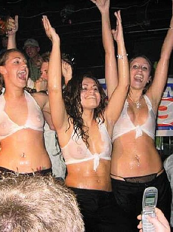 A bunch of titties, asses and vulvas jiggle about in a dingy strip joint, while some whores high five each other like they just won the lotto.