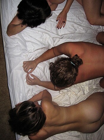 """
A group of dirty fuckers enjoying each other's company.
""" 
Or,
"""
A threesome in action with one person grabbing the other's ass cheeks.
"""