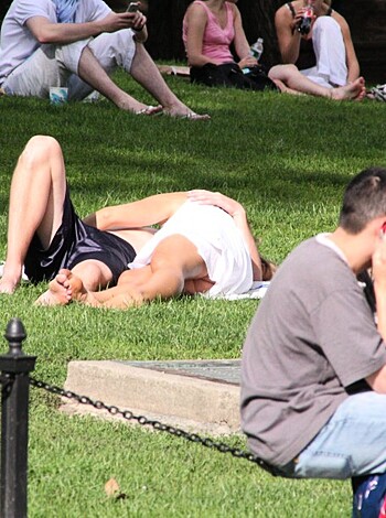 Dick squeezers get some rays on their tits while baking balls on the beach.