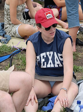 "A fucking hot chick loungin' in her bikini, ass on the grass."