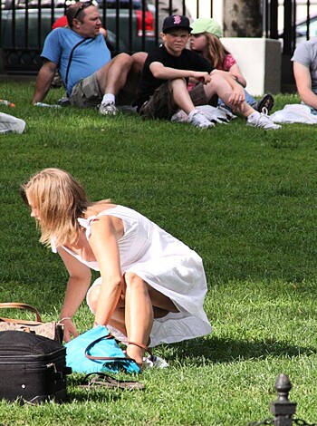 Vulgar description: Look at this bitch, her fucking pussy is hanging out with her sexy ass bent over, pickin' shit off the floor like a goddamn whore.