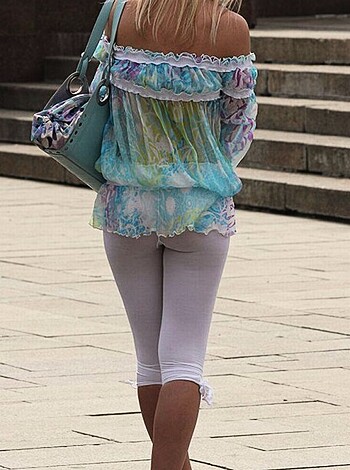 "Check out this bitch in her fucking shirt and pants, banging on her cell phone while she strolls the damn street."
