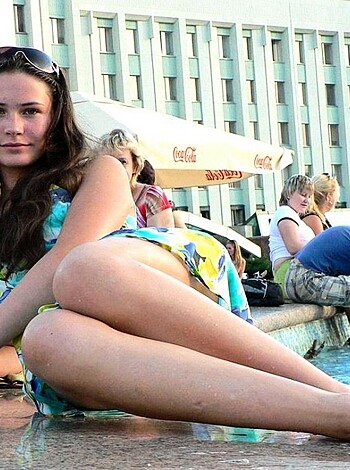 """
Bitch loungin' naked as fuck on some public fountain shit, lookin' hella hot while makin' waves and throwin' bubbles like she owns the place.
"""