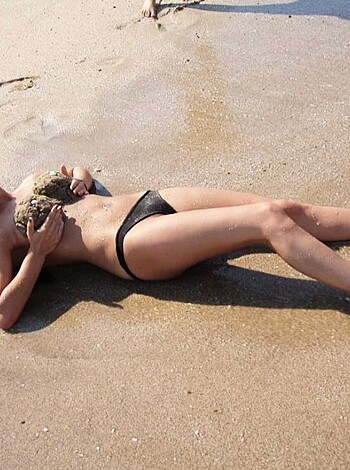 "Bitch on beach naked as fuck."