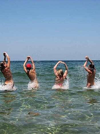"Fucking hot chicks show off their fucking tits and asses on the fucking beach."