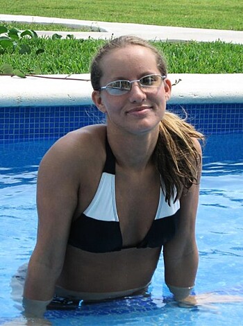 "Here's a hot chick with tits out, ass out and legs spread wide for all to see while she sits on the edge of the fucking pool."