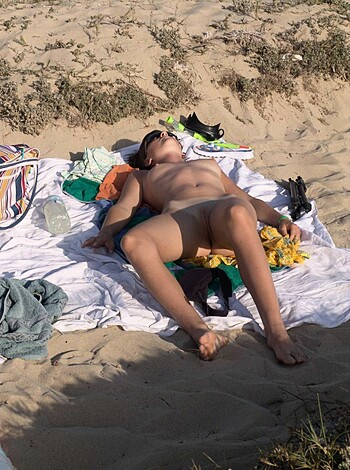 "Beach dickhead taking a fucking nap on some cheap ass beach towel."