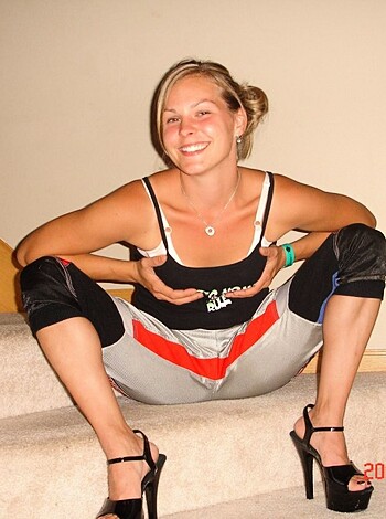 You call that a fuckin' photo shoot? Bitch looks like a cheap whore in some shitty lingerie and a pair of hoochie mama heels, all bent over like a damn prostitute. Pass the fuck out already.
