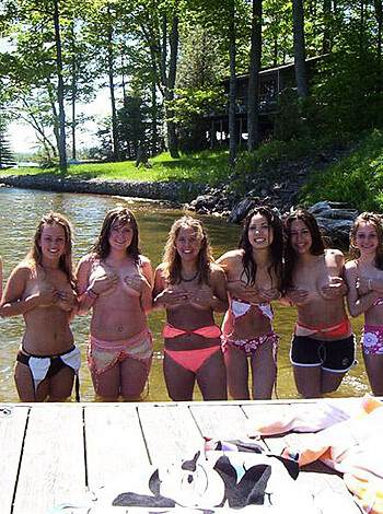 """
Here's a pic of some chicks in bikinis by the shore, probably getting fucked up on vacation.
"""