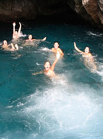 "Here's an image of a bunch of f*ckers taking a dip in a dick-shaped cave."