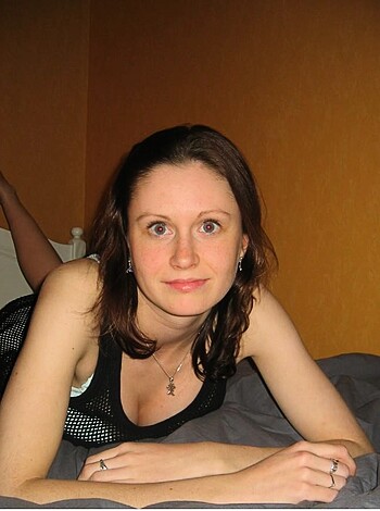 """
Horny bitch in sexy lingerie fucking herself on mattress.
"""