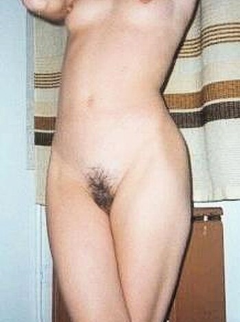 "Bare tits and bush on full display."