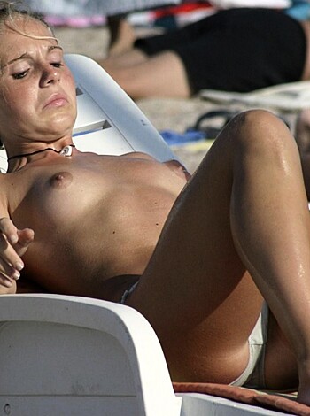 Vulgar description: 
"Fucking hot bitch tits out, sunbathin' n' suckin' dick."